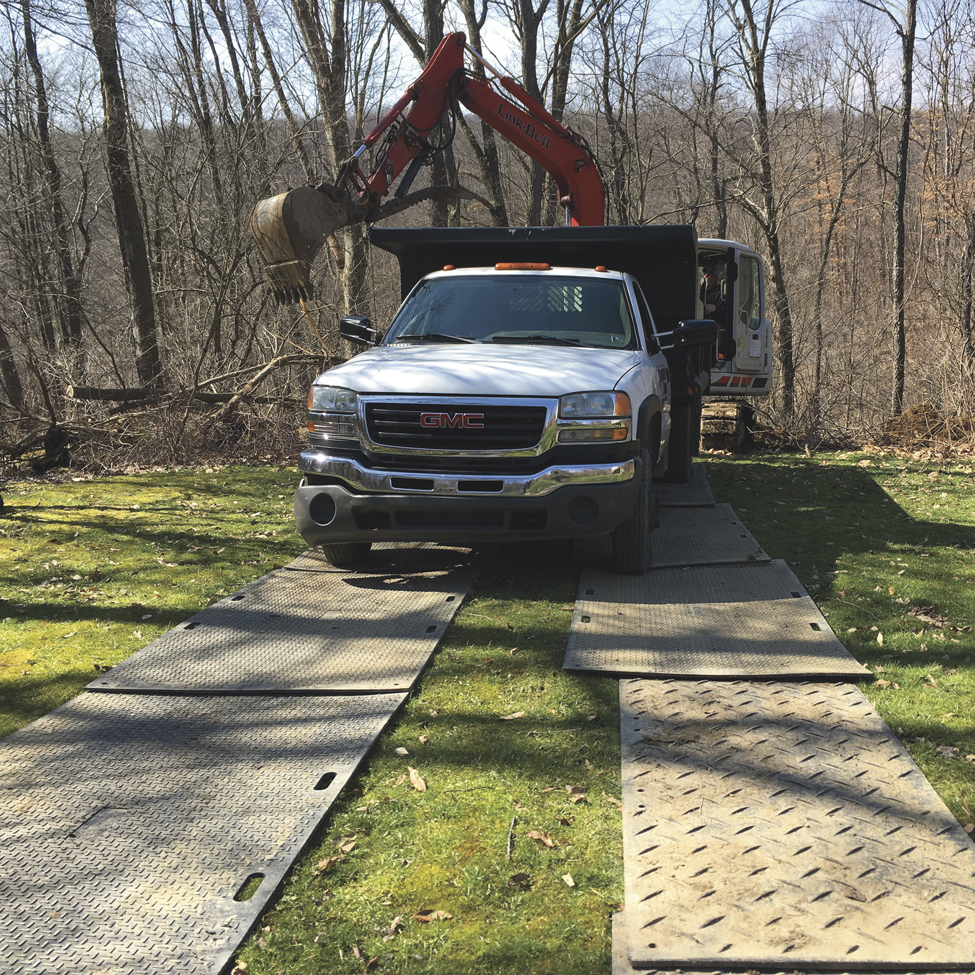 Truck Driving on Ground Protection Mats